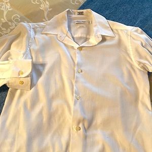 Boy’s white shirt.